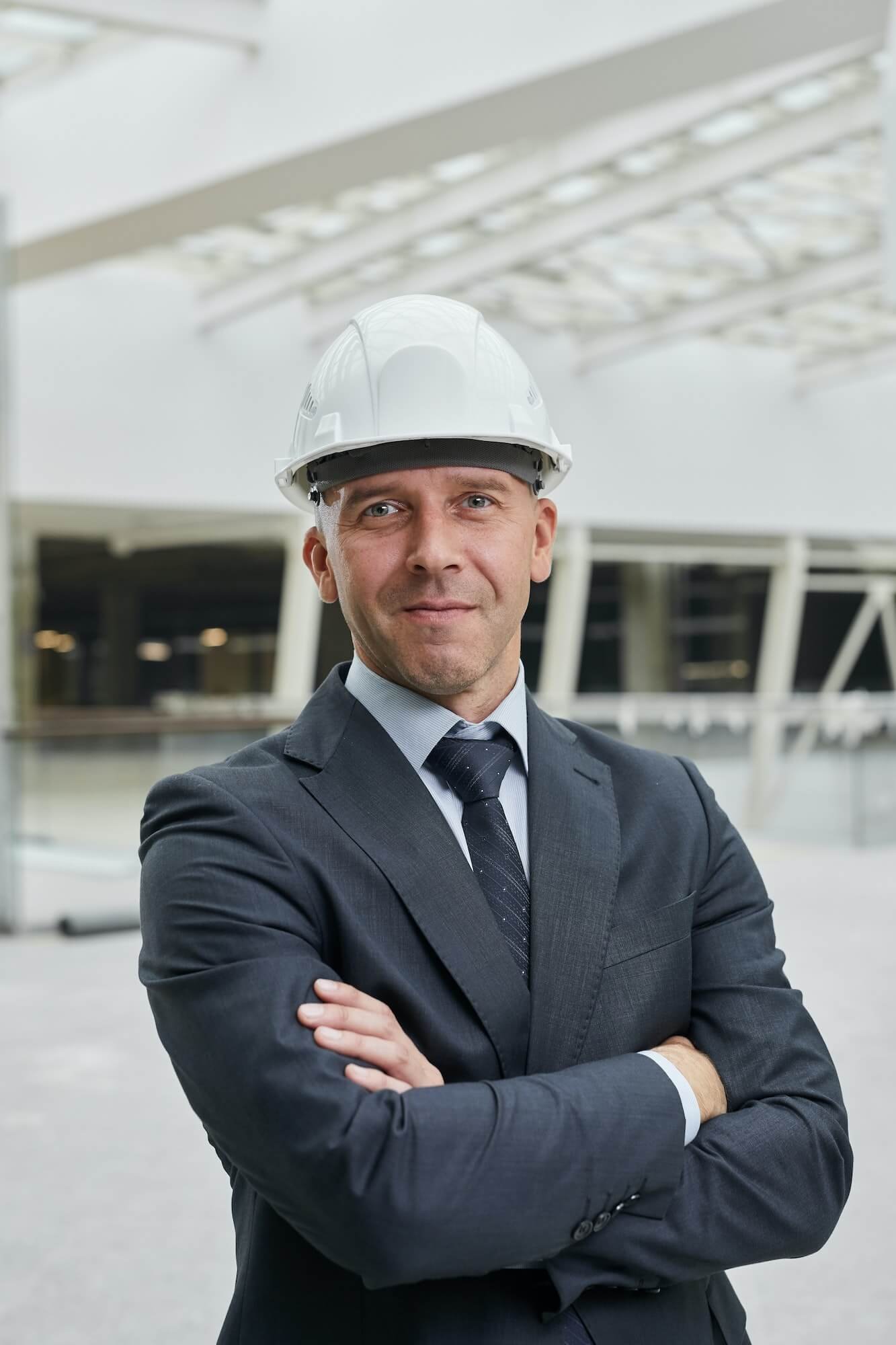 confident-businessman-at-construction-site-1.jpg